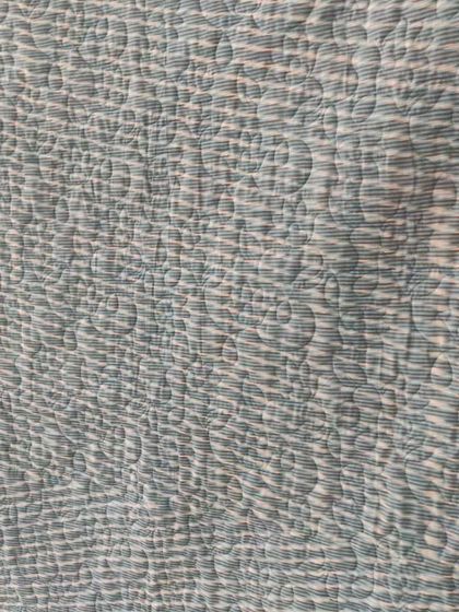 A detail shot of the quilting texture on the back.