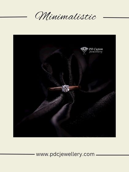 A minimalist solitaire ring set in 18kt hallmarked gold. This piece is the epitome of understated elegance, perfect for someone who loves classic, simple jewellery.