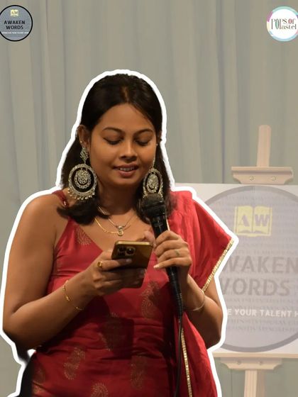 An artist reads her poetry, adorned with beautiful earrings that match her creative spirit.