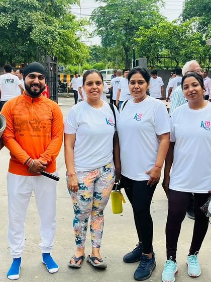 A photo with some of the enthusiastic participants at the Kailash Hospital yoga event.