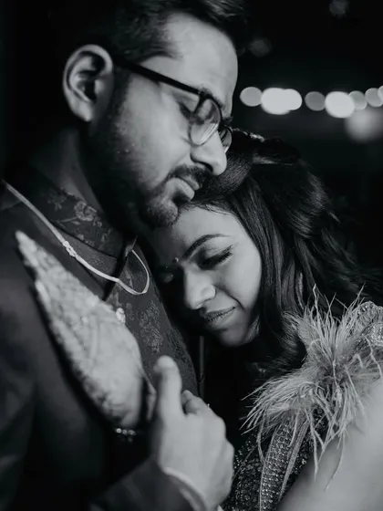 A beautiful black and white portrait capturing a quiet, emotional moment between the couple. The monochrome tones add a timeless and classic feel.
