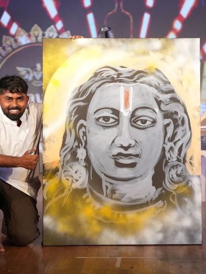 Posing with my completed artwork at the Advaya 2024 festival. The energy of live events inspires me to create art that connects with the audience on a deeper level.