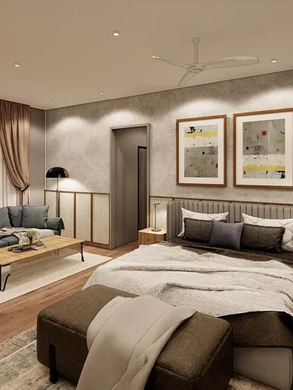 This master bedroom is a blend of comfort and style, featuring muted tones and natural wicker accents. The custom paneling behind the bed adds architectural detail, while the cozy seating area makes it a true retreat.