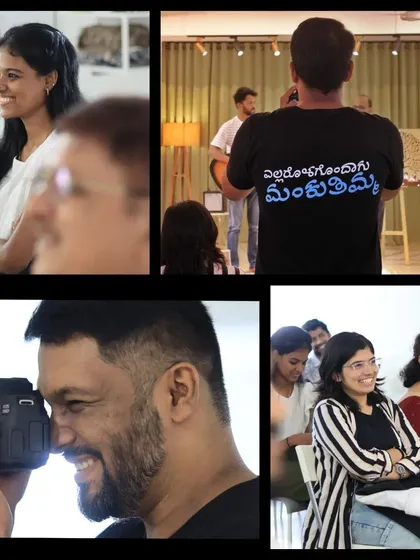 A photographer in action, capturing the smiles of the audience.