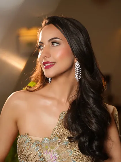 The sparkle of gold. I styled this one-shoulder draped saree-gown with cascading diamond earrings for a look of pure Hollywood glamour.