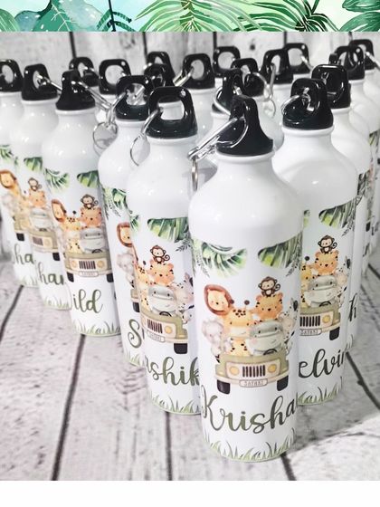 A large order of personalized jungle safari water bottles, each with a different name in a beautiful script font.