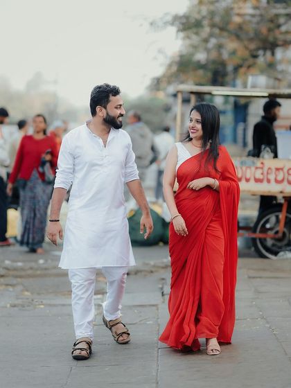 A candid moment of conversation while strolling through the market.