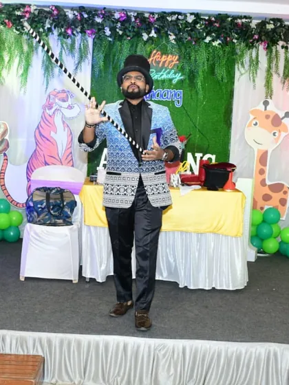 The classic dancing cane illusion. This is a graceful and mesmerizing trick where the cane seems to float and dance all on its own, a favorite at stage shows.