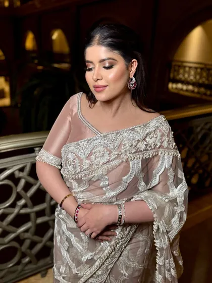 Did someone say cocktail glam? Sanjana is serving effortless elegance with her stunning shimmery eyes, glowing dewy skin, and perfect pink lips.