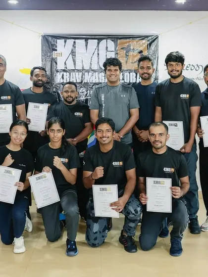Participants proudly display their certificates after completing the Third Party Protection Seminar in Mangalore. These events build both skills and a community of prepared individuals.
