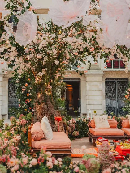 Another view of the enchanting floral tree, showing the layers of pink and white blossoms. This kind of statement decor piece becomes a major talking point of the event.