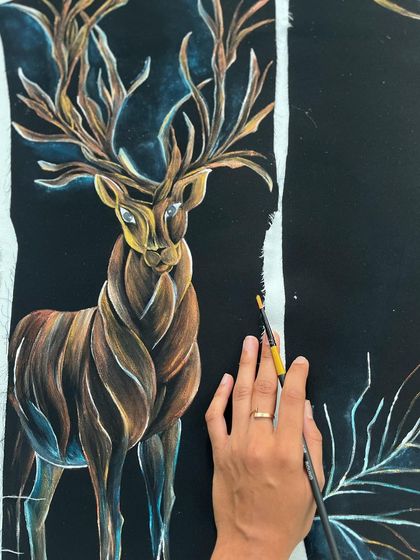 A close-up of the hand-painted deer on velvet. You can see the detailed brushwork used to create texture and depth in the antlers and fur, making the animal look majestic.