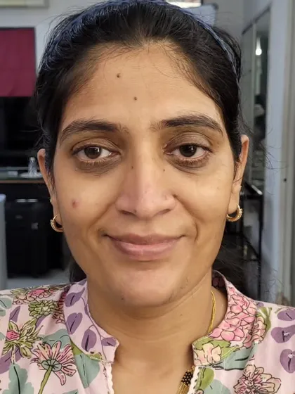 The 'before' image for a corrective makeup session, showing the client's skin prior to foundation and color correction.