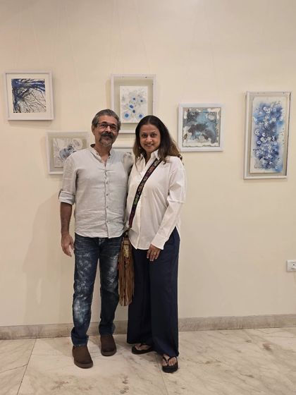 A sneak peek into my phone gallery. Here I am with a fellow artist at an exhibition. I love being part of the art community.