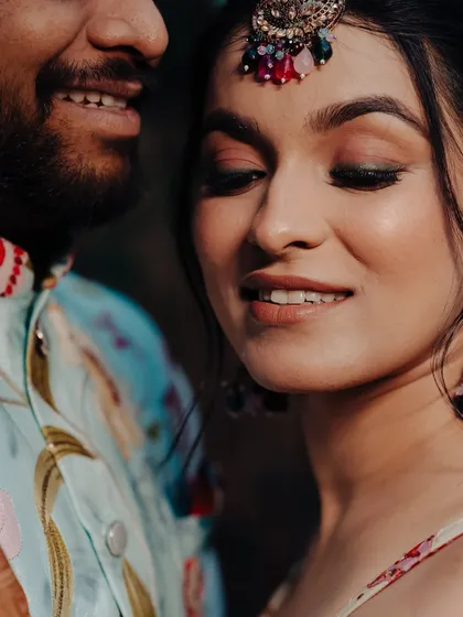 A close-up of the bride's Haldi makeup, featuring soft, shimmery eyes and a natural lip.