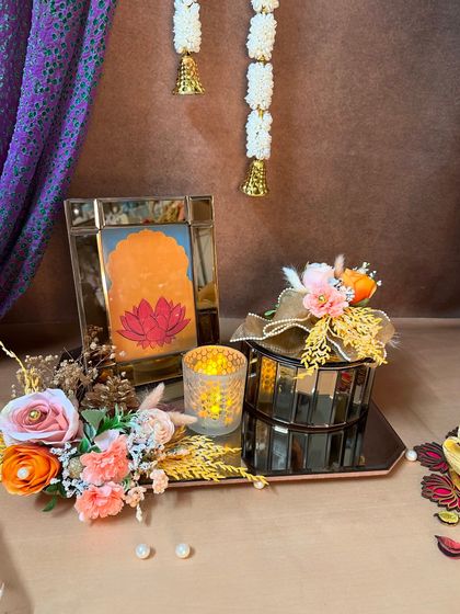A slightly different angle of the lotus-themed hamper, showing the lit candle and beautiful floral arrangement. It’s a gift designed to bring peace and joy.