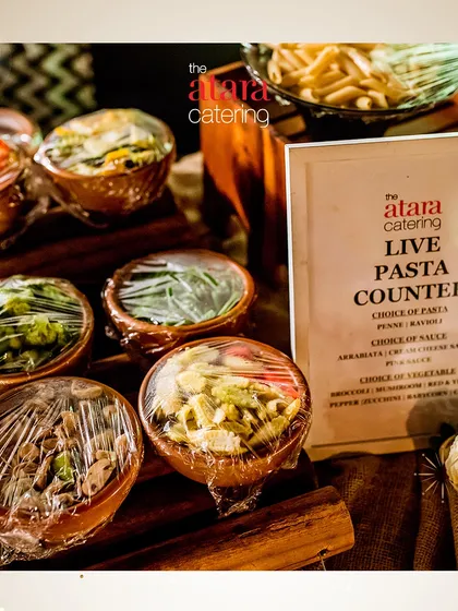 Our live pasta counter set up for a festive New Year's Eve event. We ensure every detail, from the ingredients to the signage, is perfectly arranged for a seamless experience.