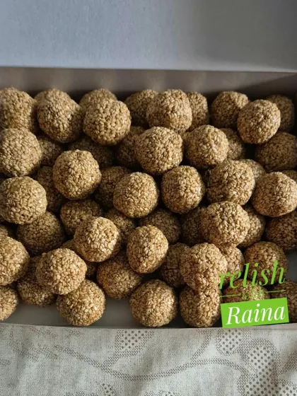A box filled with my Til Laddoos, made from unpolished white sesame seeds and jaggery. These are a traditional winter treat, rich in calcium and flavor.