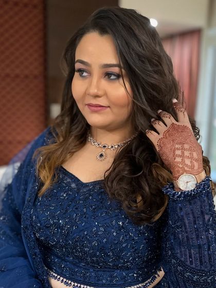 A candid side profile, showing how the makeup and hairstyle look natural and beautiful from all angles.