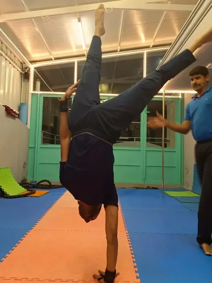 A collection of different partner handstand variations. These exercises range from handstands on a partner's back to one-arm assisted holds, all designed to build strength and teamwork.