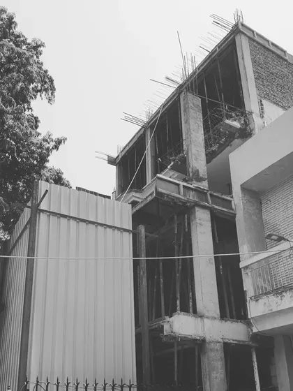 Another perspective of the West End site in progress. This angle shows how the new structure interacts with the neighboring properties.