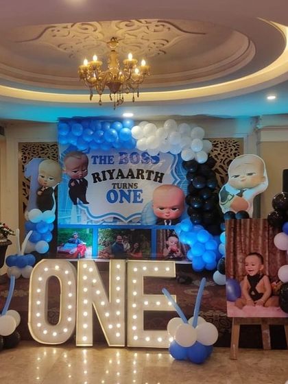 Another view of the Boss Baby first birthday stage, showing the full extent of the decorations.