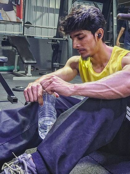 Another shot from a gym session, focusing on hydration. Listening to your body and giving it what it needs is a crucial part of any fitness journey.