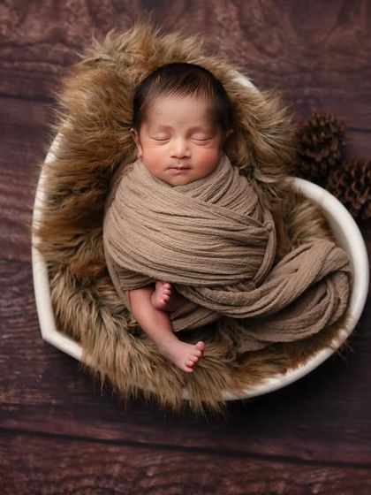 The sweetest little boy has my heart. A classic portrait using earthy tones and natural textures to create a warm and cozy feel.