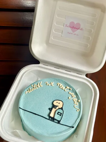 A sweet farewell bento cake with the message 'until we meet again'. It’s a thoughtful way to say goodbye to a friend who is moving away.
