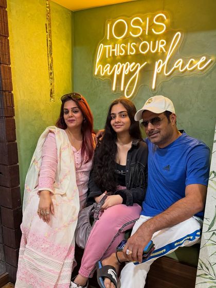 Another shot of this lovely family enjoying their time at the salon. I believe in creating a welcoming environment for families to relax and connect.