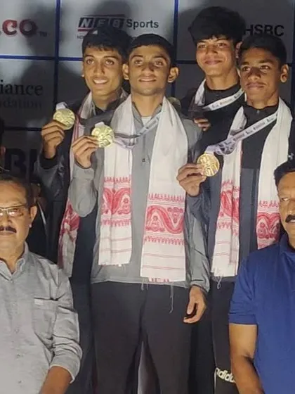 The Maharashtra relay team, including my athlete Jason, on the podium after winning Gold at the Junior National Athletics Championship.