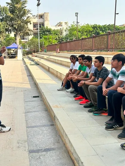 A classroom session on the pool deck. Virdhawal Khade shares his experiences and mental strategies with our young swimmers, offering invaluable lessons on focus, resilience, and competing under pressure.