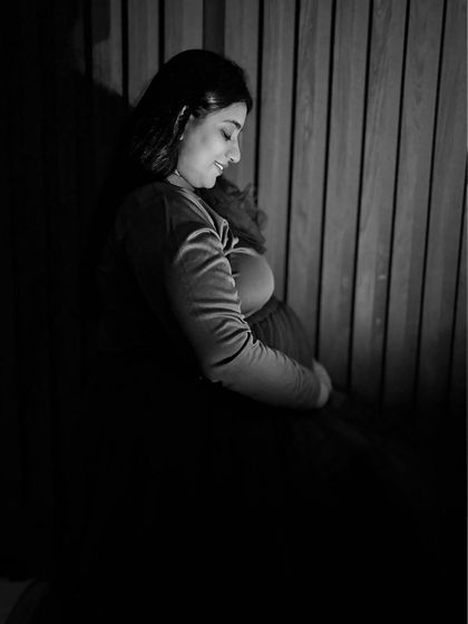 This olive green tiered gown is shown here in a family portrait, proving it's a wonderful choice for capturing moments with your loved ones.