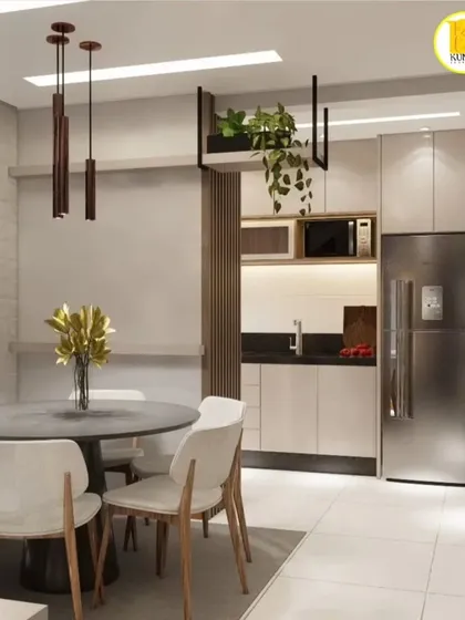 An open-concept living space where the dining area is adjacent to a compact kitchen. We used a hanging planter and vertical slats to subtly divide the spaces while maintaining an open feel.