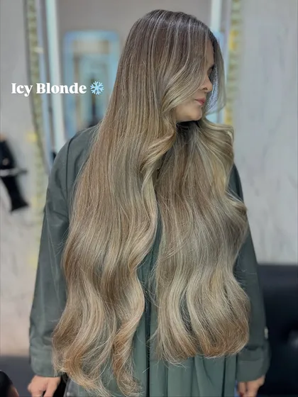 This is the kind of Icy Blonde transformation that turns heads. I meticulously work to achieve this cool, clean tone while keeping the hair healthy and full of movement, creating a truly luxurious and modern look.