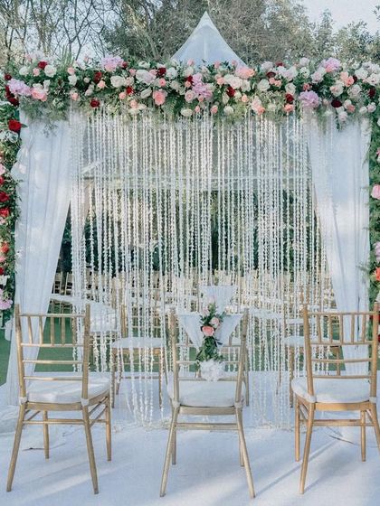The stage is set for an intimate Nikah ceremony. The elegant floral and crystal decor creates a breathtaking focal point for the vows.