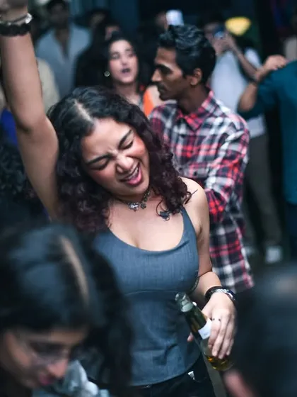 A girl lost in the music on the dance floor. That's the goal.