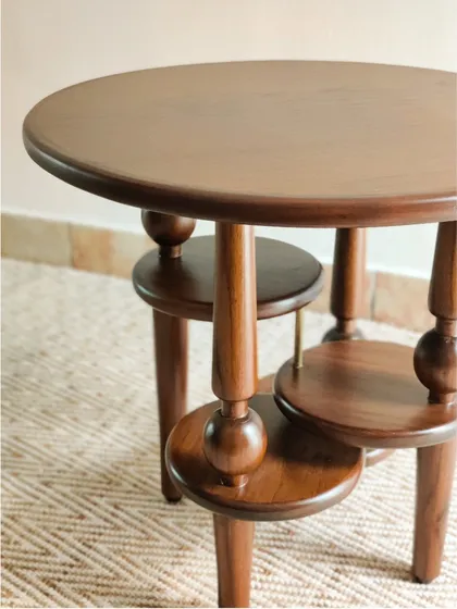 More views of the Vibhinna Side Table, showcasing its intricate craftsmanship and unconventional design, perfect for adding a point of interest to any living room corner.