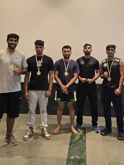 Our team of champions. Five of our students pose with their gold medals after a clean sweep at the district championship.