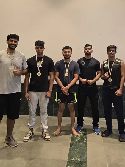 Our team of champions. Five of our students pose with their gold medals after a clean sweep at the district championship.