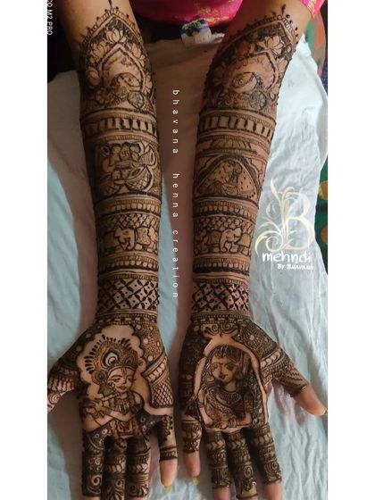 A slightly different angle of the Radha-Krishna design, emphasizing the full arm coverage and the balance between the divine figures and traditional motifs.