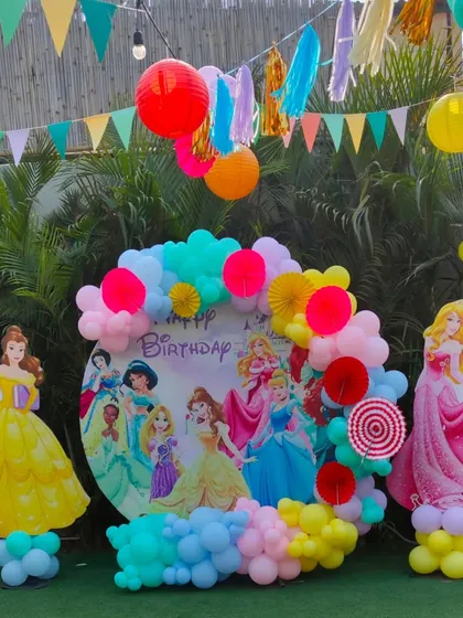 This Disney Princess backdrop brings all the beloved characters together, surrounded by colorful balloons and festive paper lanterns.