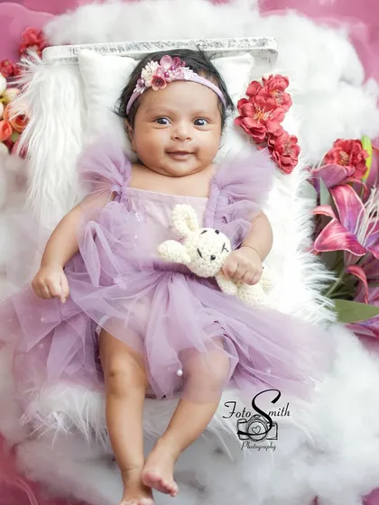 Another joyful, awake moment from the same session. She is holding her little bunny and looking so content and happy.