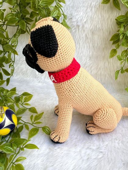 A full view of the "Simba" the pug replica doll. I used special techniques to shape his face and get his sweet, wrinkly expression just right. The collar is even personalized with his name.