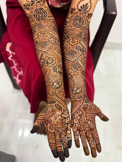 A full view of the 'Khalil' design. The mix of flowers, leaves, and checkered patterns is stunning.