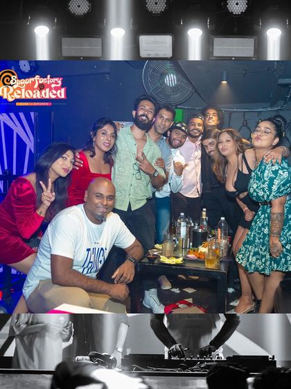 A group of friends celebrating at a VIP table. I can arrange special packages for group bookings.