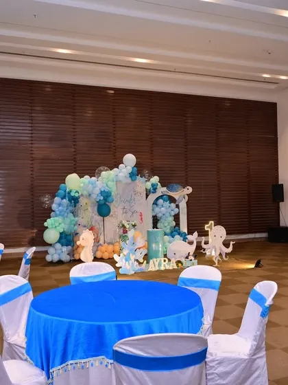 Another view of the venue, showing the relationship between the guest seating and the main decorative stage.