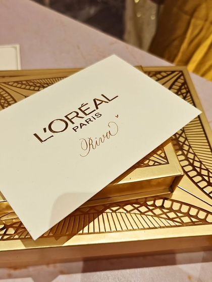 Another personalized card from the L'Oréal event, showcasing the clean and elegant script. Each name is written with care, making every guest feel individually celebrated.