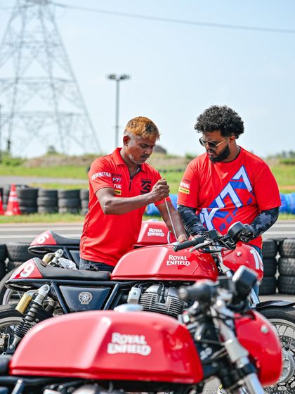 A rider gets hands-on instruction from a coach. Our students value the personalized attention and technical guidance they receive.