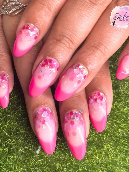 A beautiful Valentine's Day design with pink glitter tips and encapsulated heart sequins. It's all about romance and sparkle.